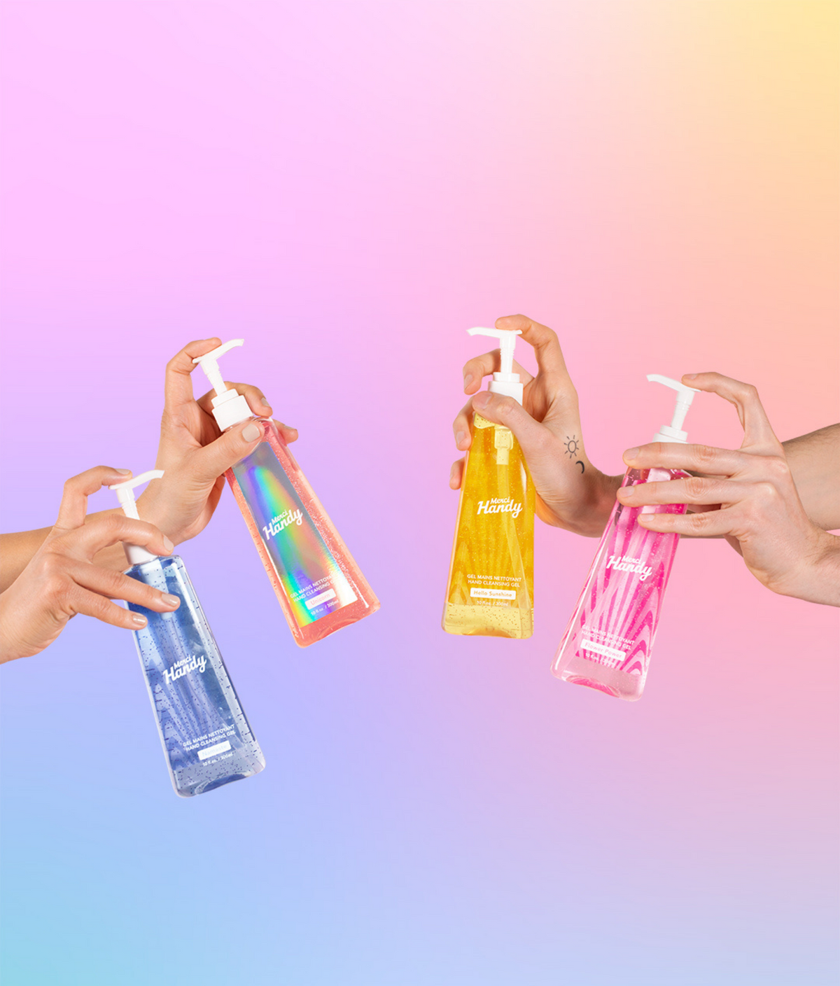 Gel Mains Nettoyant Unicorn Edition Grand Format Merci Handy – mains tenant les flacons pompe de la gamme